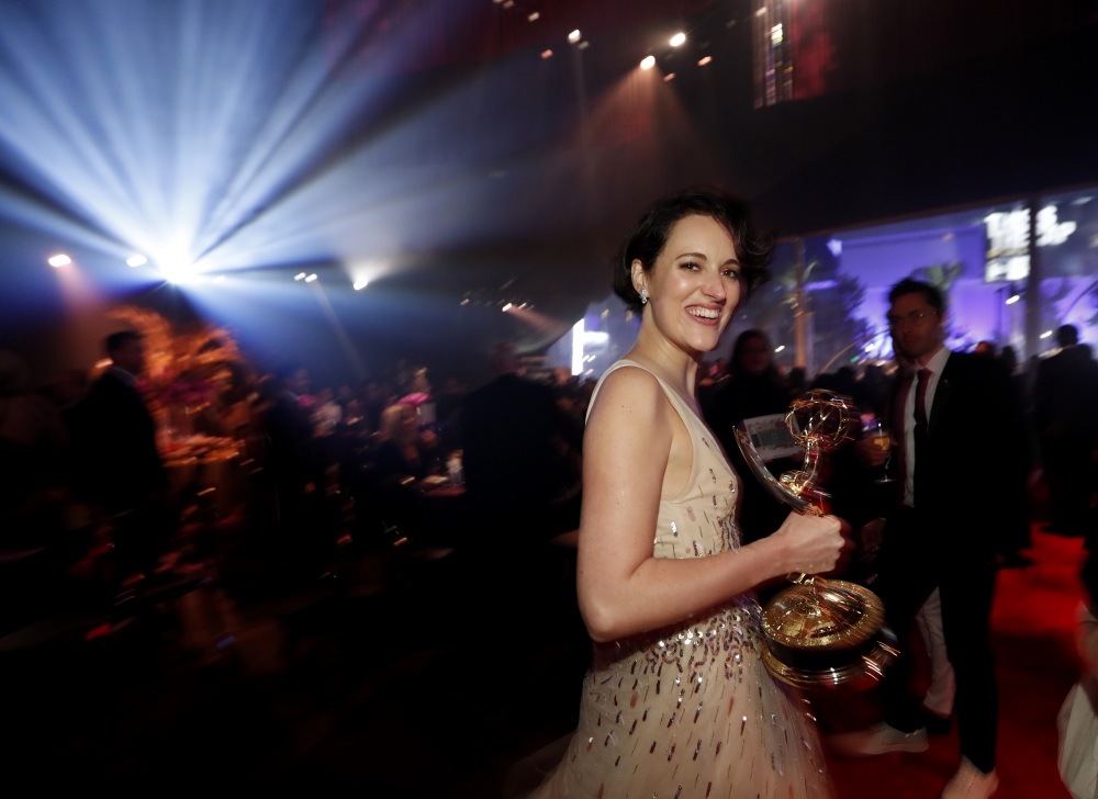 Phoebe Waller-Bridge poses with her award for Lead Actress in a Comedy Series for