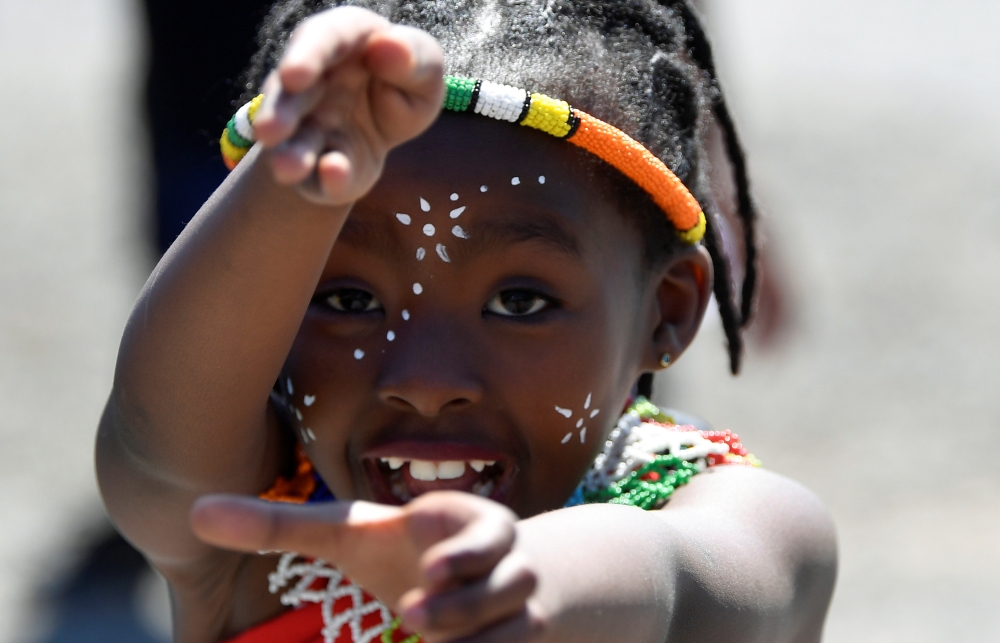 A local dancer is seen ahead of the arrival of the Duke and Duchess of Sussex, Prince Harry and his wife Meghan, in Nyanga township, on the first day of their African tour in Cape Town, South Africa, September 23, 2019. REUTERS/Toby Melville