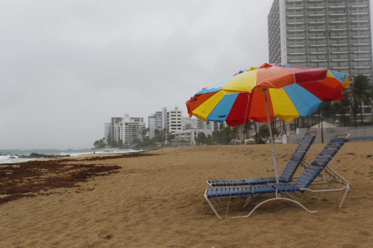 Beach chairs are seen at a beach as hurricane Irma approaches Puerto Rico in San Juan on September 5, 2017. AFP/Ricardo Arduengo