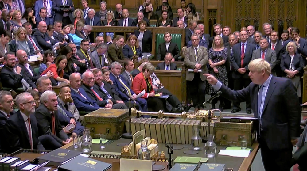 Britain's Prime Minister Boris Johnson gestures as he speaks at the parliament, which reconvenes after the UK Supreme Court ruled that his suspension of the parliament was unlawful, in London, Britain, September 25, 2019, in this screengrab taken from vid