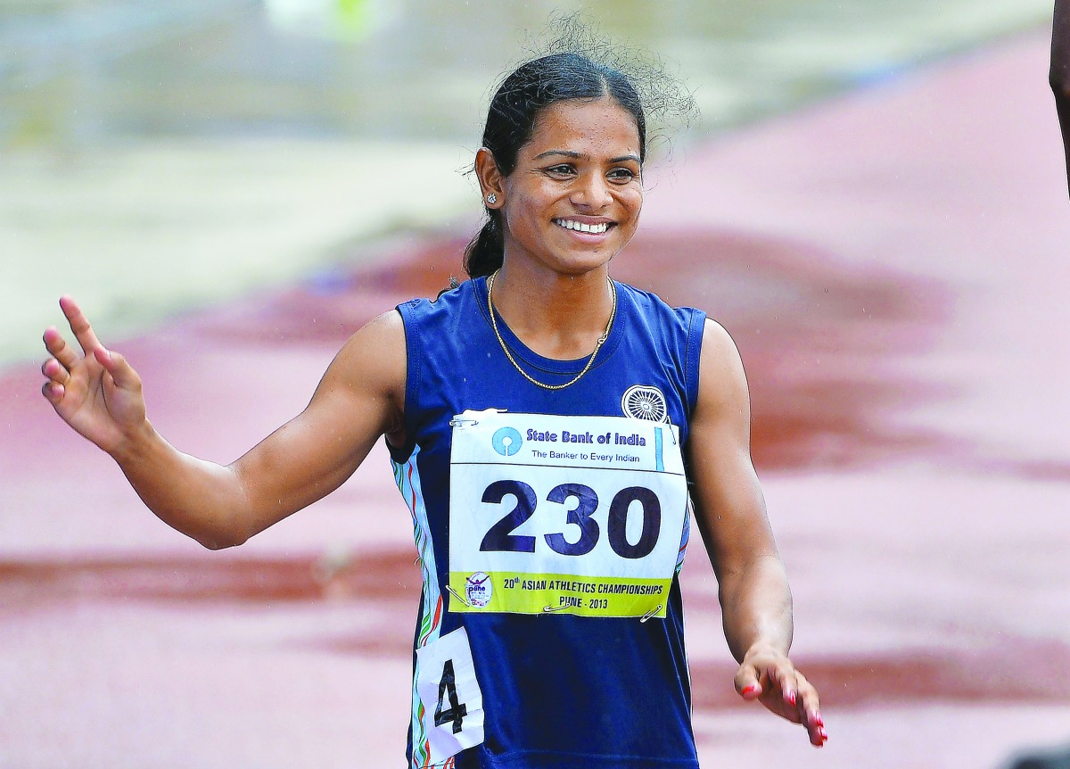 India’s Dutee Chand waves to the crowd after her race in this file picture. 