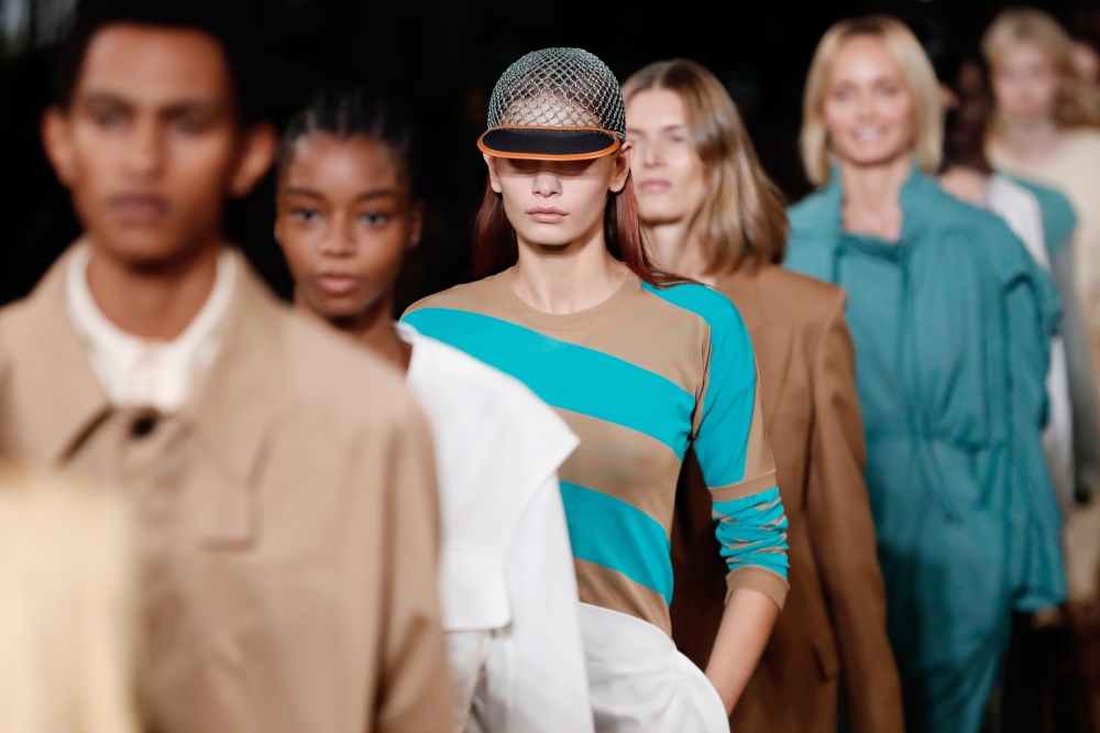 Models present a creation by Stella McCartney during the Women's Spring-Summer 2020 Ready-to-Wear collection fashion show at the Opera Garnier in Paris, on September 30, 2019. AFP / Thomas Samson 