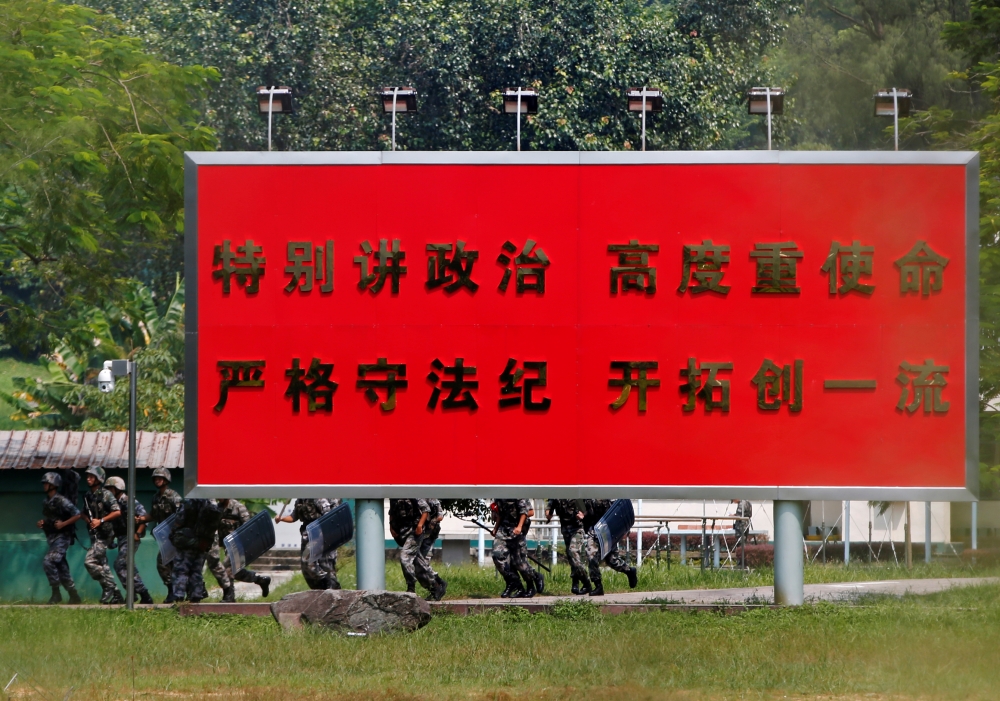 Chinese troops conduct riot drills inside a PeopleÕs Liberation Army (PLA) base in Tam Mei, Hong Kong, China September 28, 2019. Reuters/James Pomfret