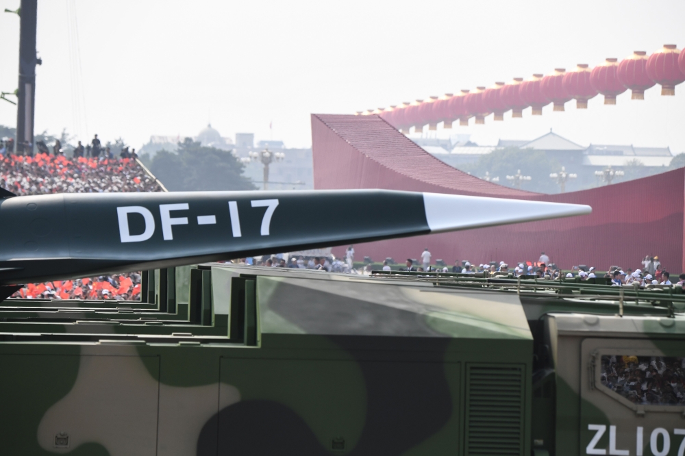 A DF-17 missile is presented during a military parade at Tiananmen Square in Beijing on October 1, 2019, to mark the 70th anniversary of the founding of the People’s Republic of China. / AFP / GREG BAKER