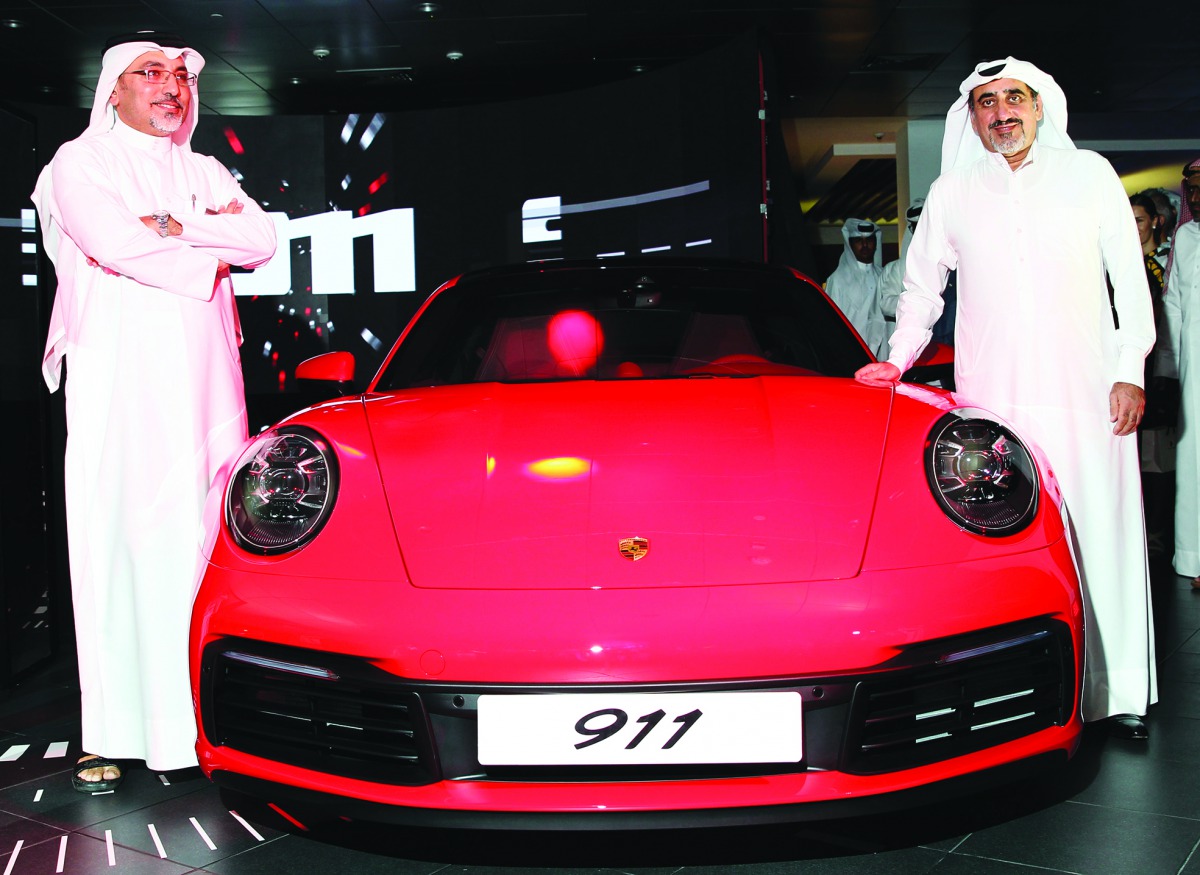 Salman Jassem Al Darwish, Chairman and CEO of Porsche Centre Doha (right); and Porsche Centre Doha Brand Manager, Ahed Dawood, revealed the eighth generation of the Porsche 911 at a special event held by Porsche Centre Doha, Al Boraq Automobiles Co WLL, a