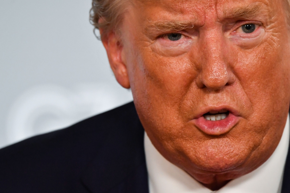 (FILES) In this file photo taken on August 25, 2019, US President Donald Trump speaks during a bilateral meeting with Indian Prime Minister Narendra Modi in Biarritz, south-west France, on the third day of the annual G7 Summit. AFP / Nicholas Kamm