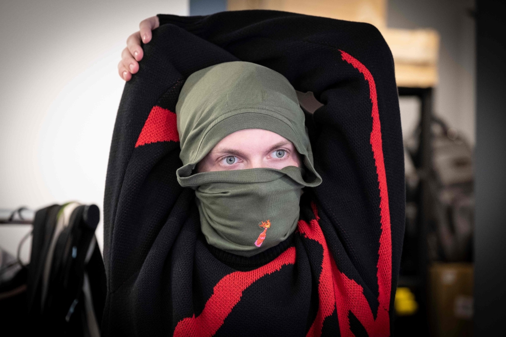 A model wears a creation by the Fashion designer Alina Muzychenko in Moscow on September 17, 2019. AFP / Yuri KADOBNOV