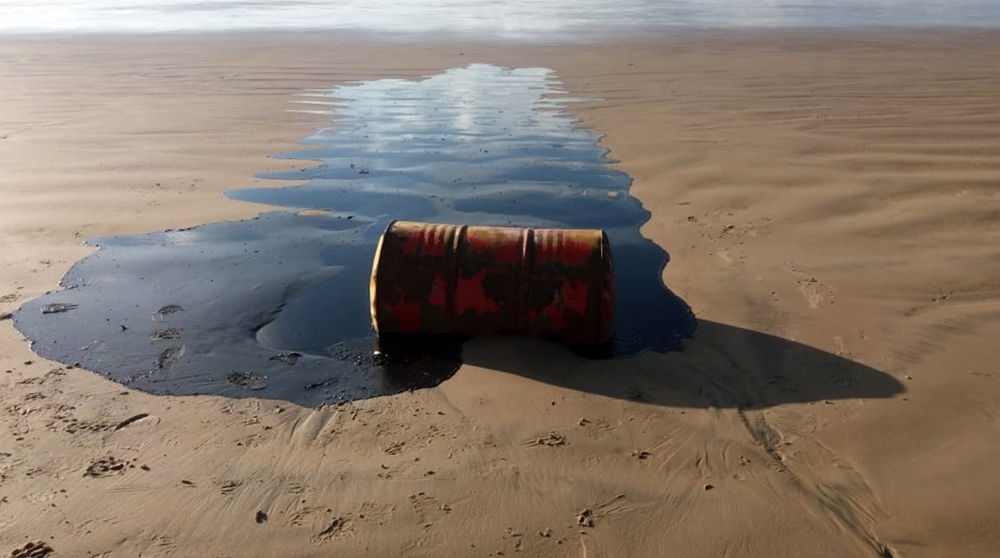 Handout picture by the Sergipe State Environment Administration (Ademas) on September 27, 2019, showing a barrel of oil spilled on a beach in Barra dos Coqueiros municipality, Sergipe state, Brazil. AFP / ADEMA