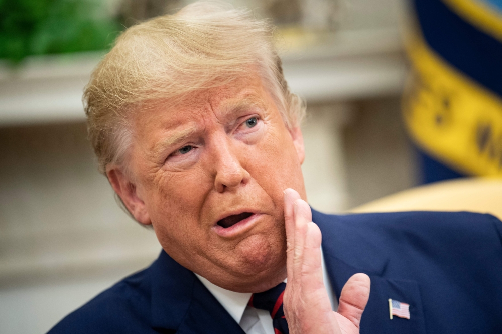 US President Donald Trump speaks to the press during a meeting with President of Finland Sauli Niinisto at the White House October 2, 2019, in Washington, DC. / AFP / Brendan Smialowski