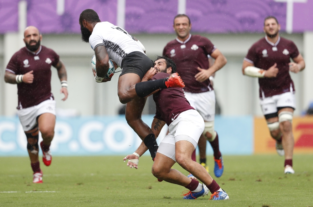 Fiji's Semi Radradra in action with Georgia's Soso Matiashvili REUTERS/Matthew Childs