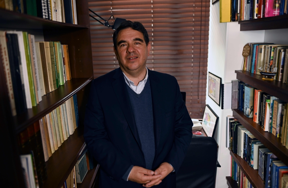 Colombian Andres Villegas -a Catholic who has a Sephardic Jewish ancestor- poses during an interview in Bogota, on September 30, 2019.  AFP / Juan Barreto 