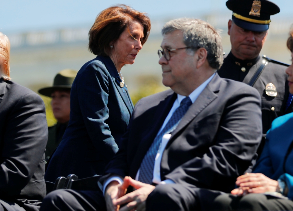 Nancy Pelosi walks behind William Barr as they both attend the 38th Annual National Peace Officers Memorial Service on Capitol Hill, May 15, 2019. Reuters / Carlos Barria