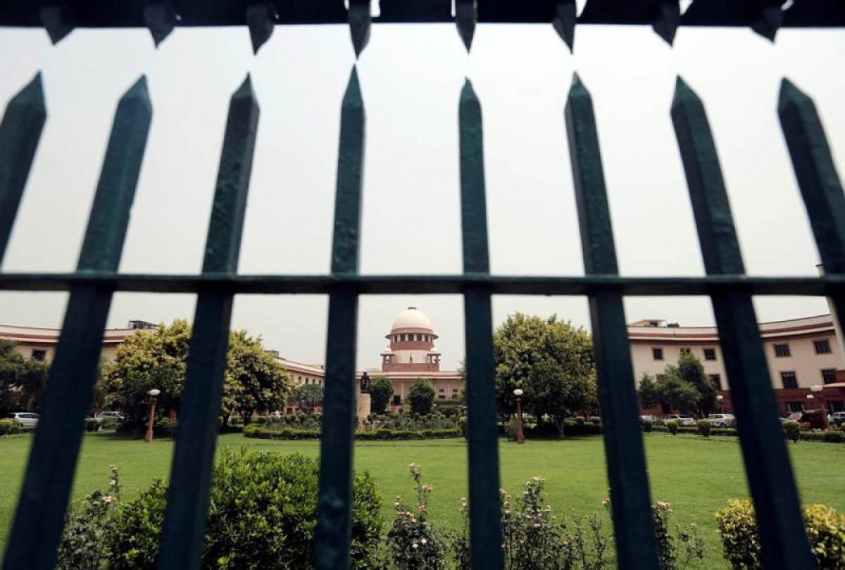 India's Supreme Court is pictured through a gate in New Delhi, India May 26, 2016. Reuters/Anindito Mukherjee