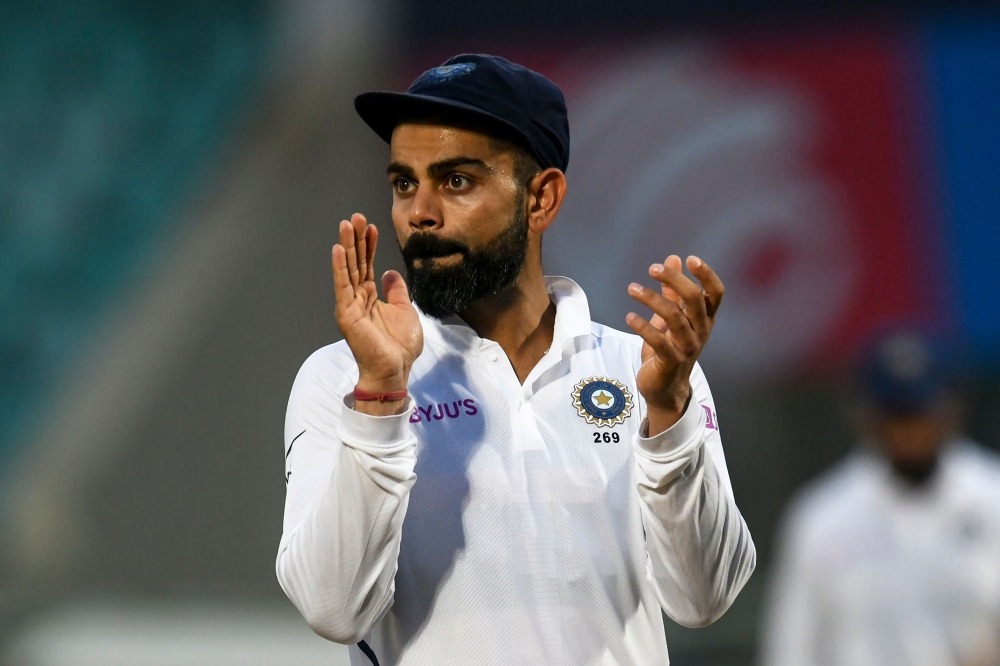 India's captain Virat Kohli claps his hands at the end of the fourth day's play of the first Test match between India and South Africa at the Dr. Y.S. Rajasekhara Reddy ACA-VDCA Cricket Stadium in Visakhapatnam on October 5, 2019. AFP / NOAH SEELAM 