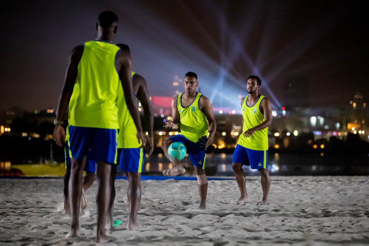 Brazilian beach soccer players take part in a training session yesterday at the Katara Beach ahead of the ANOC World Beach Games Qatar 2019 which kicks off today.  Picture: Miriam Jeske/COB