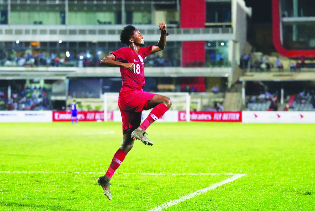 Qatar’s Yusuf Abdurisag celebrates after scoring their first goal against Bangladesh during the AFC Asian Cup China 2023 qualifier in Dhaka, Bangladesh, yesterday.