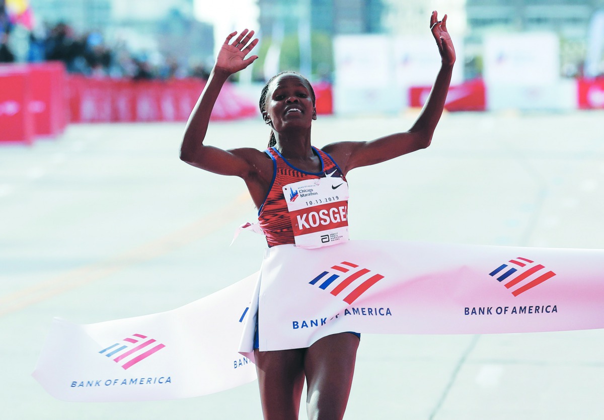 Kenya’s Brigid Kosgei winning the women’s marathon in Chicago, yesterday.