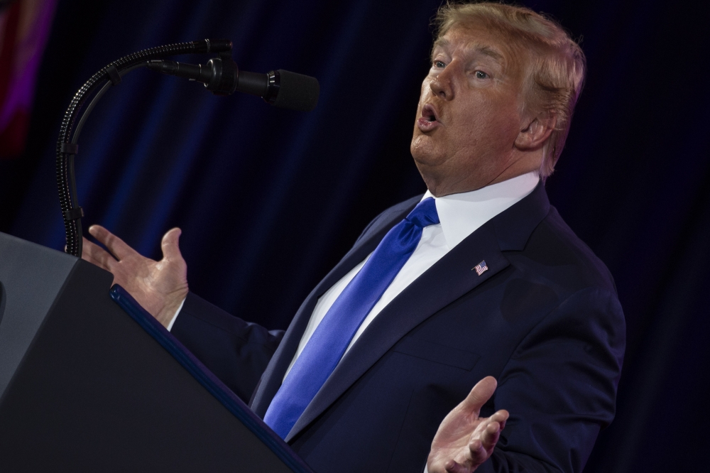 In this file photo taken on October 12, 2019 US President Donald Trump speaks at the Values Voter Summit at the Omni Shoreham Hotel in Washington, DC. / AFP / Eric BARADAT