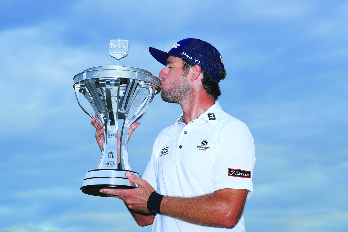 Lanto Griffin poses with the trophy after winning the Houston Open at the Golf Club of Houston on October 13, 2019 in Humble, Texas. Sam Greenwood/Getty Images/AFP