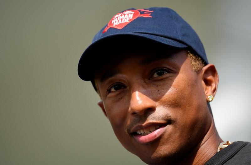 Singer Pharrell Williams attends the celebrations for German sports apparel maker Adidas' 70th anniversary at the company's headquarters in Herzogenaurach, Germany, August 9, 2019. Reuters/Andreas Gebert