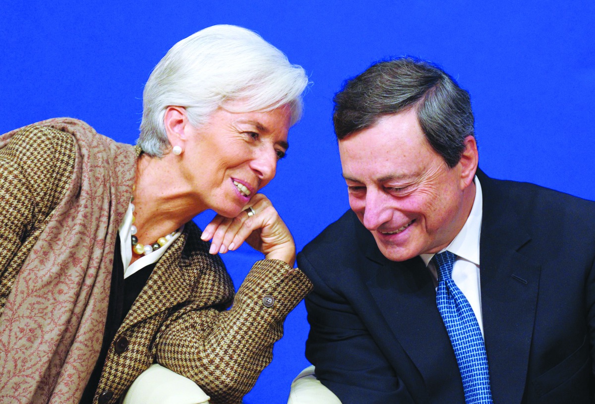 In this file photo, former International Monetary Fund (IMF) Managing Director Christine Lagarde talks with European Central Bank (ECB) President Mario Draghi during the “Treasury Talks” at French Economy and Finances Ministry. Mario Draghi’s final meetin