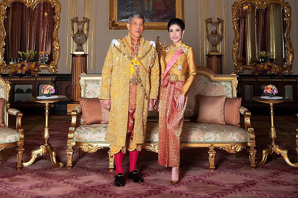 In this file undated handout from Thailand's Royal Office received on August 26, 2019, Thailand's King Maha Vajiralongkorn poses with royal noble consort Sineenat Bilaskalayani, also known as Sineenat Wongvajirapakdi. AFP