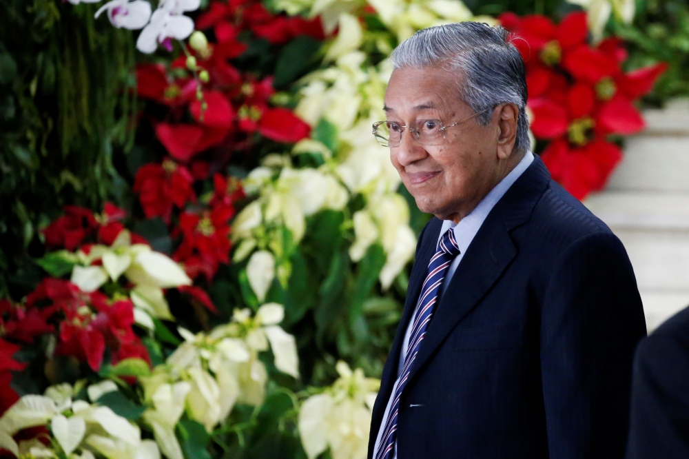 Malaysian Prime Minister Mahathir Mohamad walks after attending the inauguration of Indonesia's President Joko Widodo for the second term, at the House of Representatives in Jakarta, Indonesia, October 20, 2019. REUTERS/Willy Kurniawan