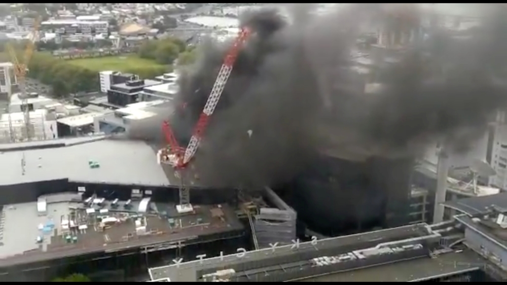 Smoke rises as fire blazes at Sky City Convention Centre, which is under construction in Auckland, New Zealand, October 22, 2019, in this still image taken from video obtained from social media. Amy Wadsworth via REUTERS 