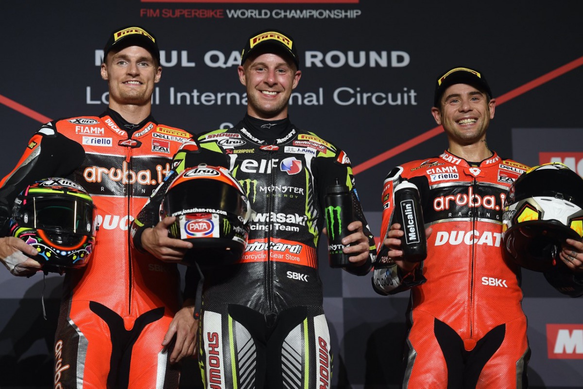 Ducati’s Chaz Davies (left), Rea (centre) and Bautista pose for a photo on the podium. 