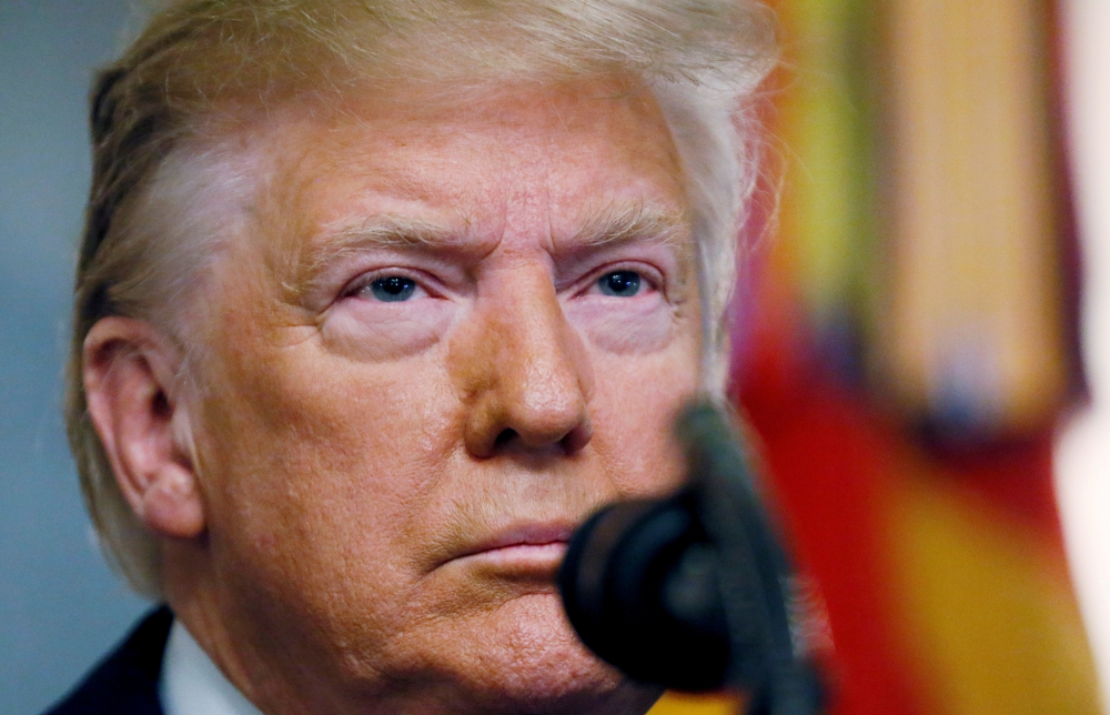 U.S. President Donald Trump makes a statement at the White House following reports that U.S. forces attacked Islamic State leader Abu Bakr al-Baghdadi in northern Syria, in Washington, U.S., October 27, 2019. REUTERS/Jim Bourg 