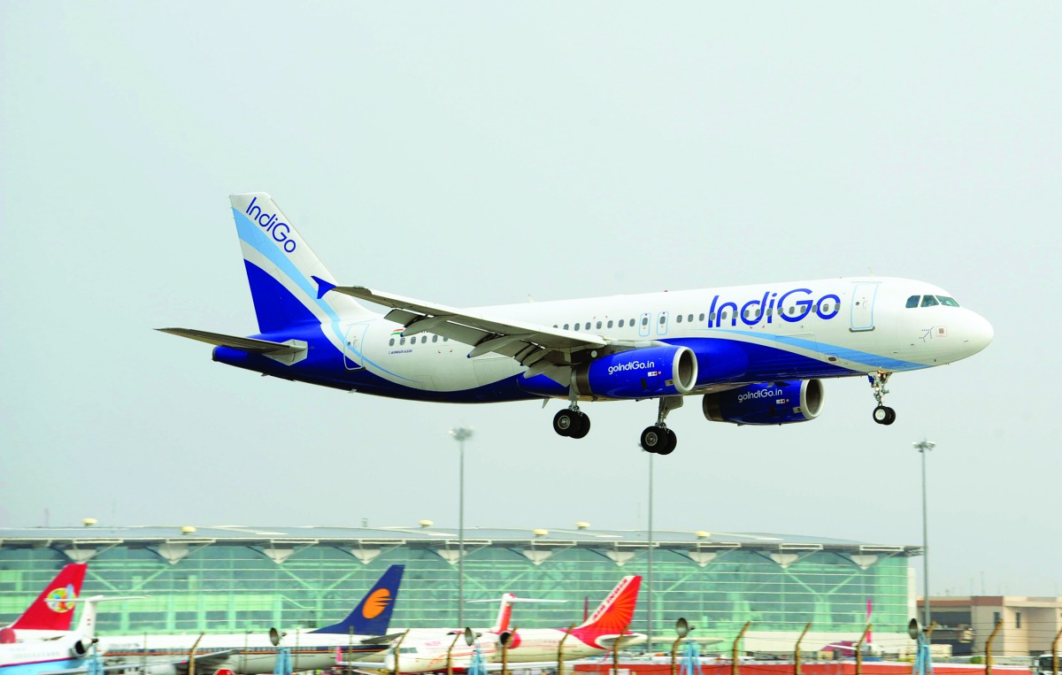 An IndiGo Airbus A320 aircraft prepares for final approach at Indira Gandhi International Airport in New Delhi,  on June 24, 2010.  AFP / Raveendran