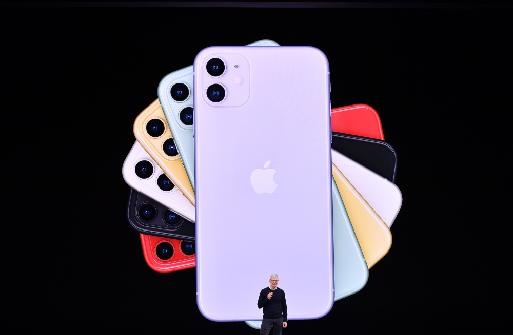 In this file photo taken on September 10, 2019 Apple CEO Tim Cook speaks on-stage during a product launch event at Apple's headquarters in Cupertino, California.  AFP / Josh Edelson 