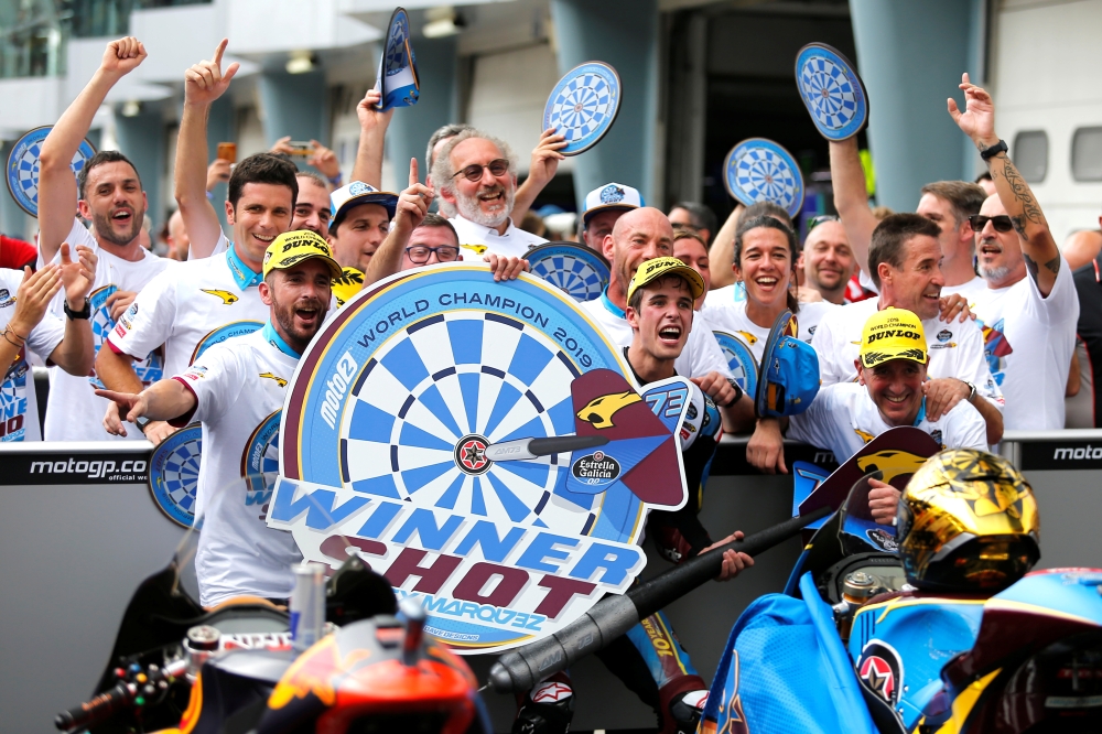Sepang International Circuit, Sepang, Malaysia - November 3, 2019 EG 0,0 Marc VDS' Alex Marquez celebrates second place and winning the Moto2 championship after the race REUTERS