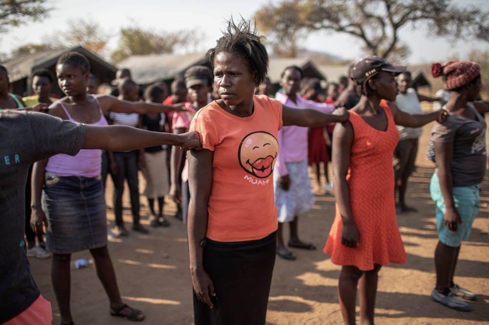 New recruits, coming from a disadvantaged and abusive background, arrive to start a selection process to join the Akashinga Ranger training programme in Phundundu, Zimbabwe on September 16, 2019.  AFP / Gianluigi Guercia
 