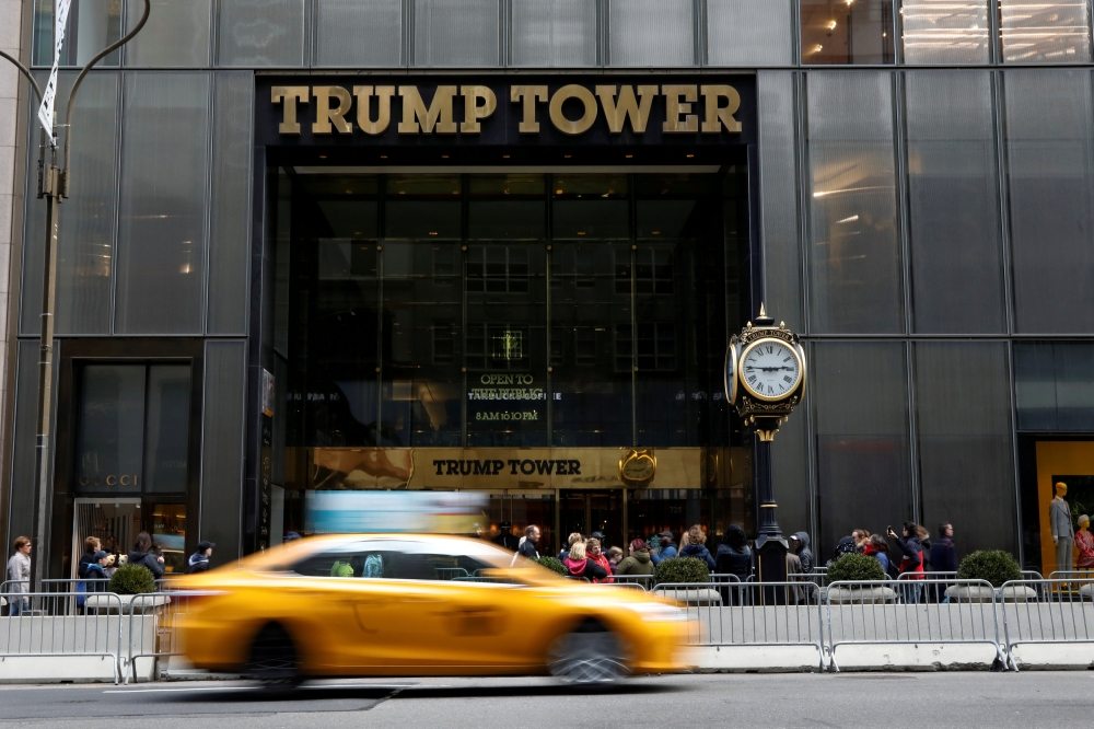 People gather outside the 5th Avenue entrance to Trump Tower in New York City, April 10, 2018. Reuters / Brendan McDermid
