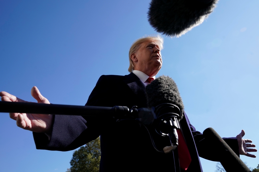 U.S. President Donald trump speaks to the media on the South Lawn of the White House in Washington upon his return from New York, U.S., November 3, 2019. REUTERS