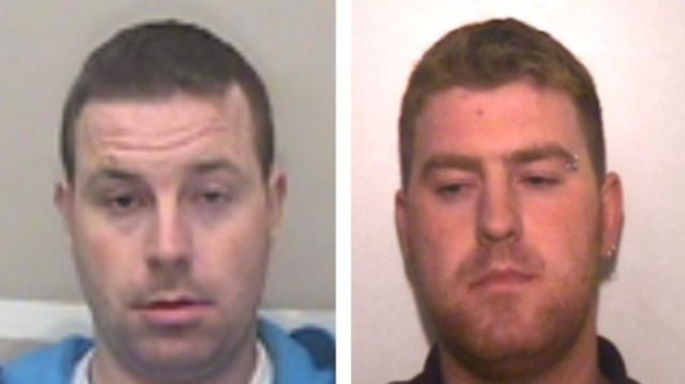A handout photo made available by Essex Police in London on October 29, 2019, shows Christopher Hughes (L) and his brother Ronan Hughes, who are being sought in connection with the discovery of the 39 Vietnamese bodies found in a truck in Grays on October