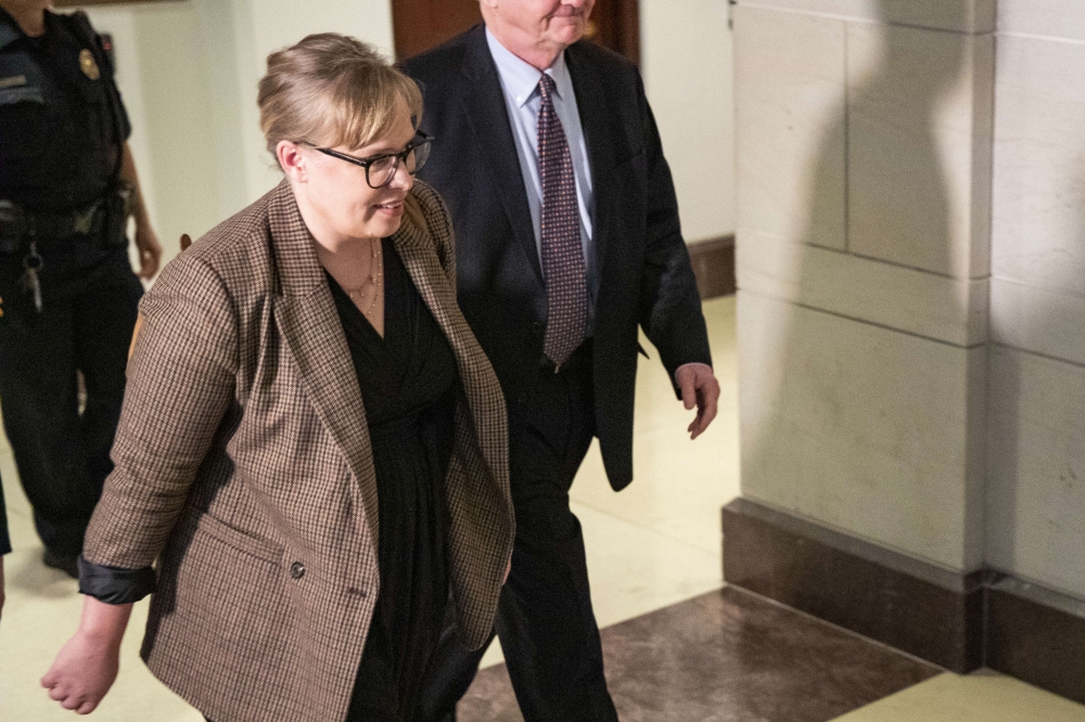 Catherine Croft, Foreign Service officer and former Ukraine specialist at the National Security Council, leaves the Sensitive Compartmented Information Facility (SCIF) after being deposed in the continued House impeachment inquiry of President Donald Trum