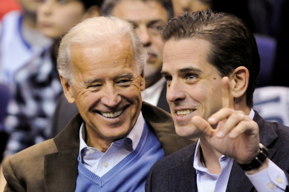 Joe Biden and his son Hunter Biden attend an NCAA basketball game between Georgetown University and Duke University in Washington, January 30, 2010. Reuters / Jonathan Ernst 