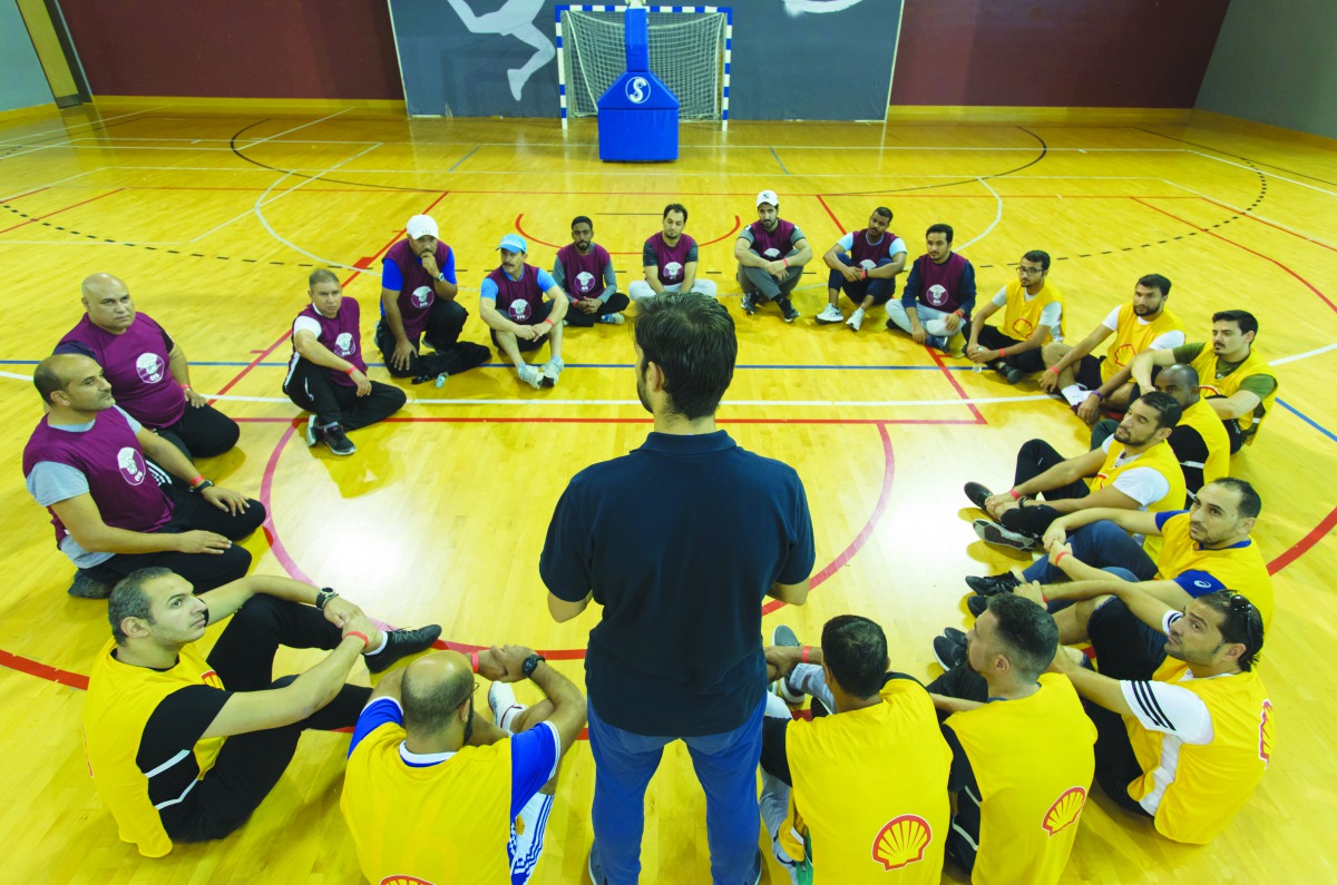 Participants attend a lecture during a two-day coaching seminar organised at Aspire Academy in preparation for the new season.