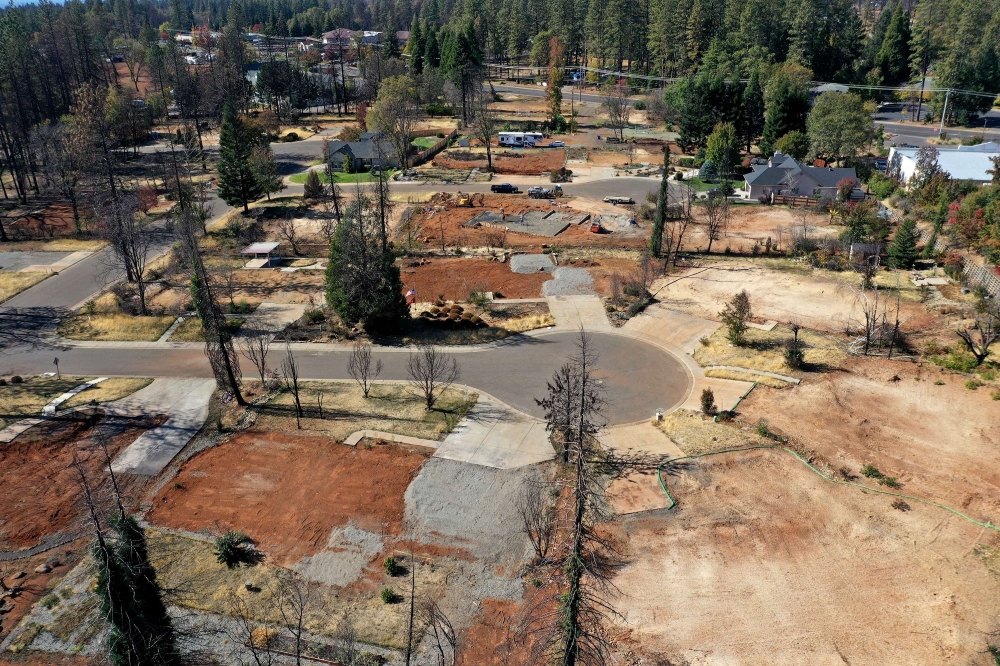 An aerial view of a neighborhood destroyed by the Camp Fire October 21, 2019 in paradise .AFP