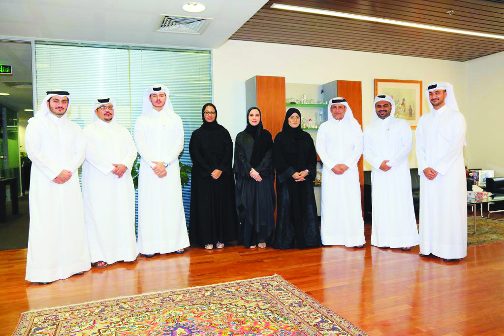 HSBC officials with the fresh Qatari graduates who joined HSBC’s business team.