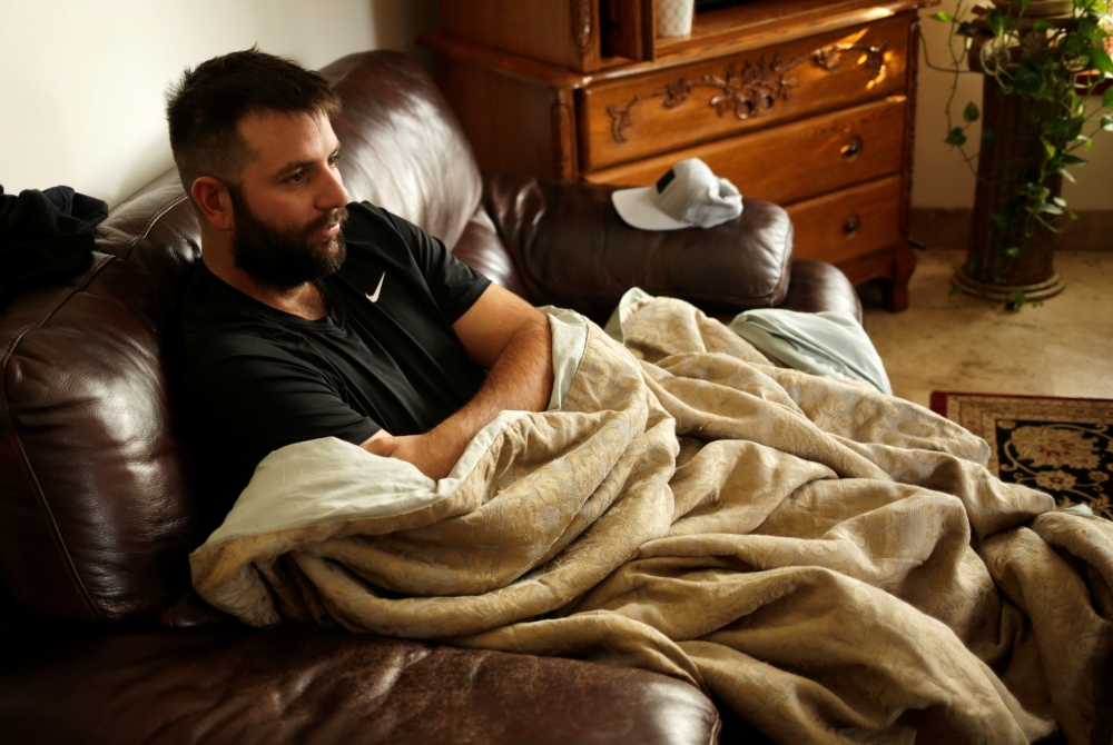 The husband of Rhonita Maria Miller, who was killed along with her children and other members of the Mexican-American Mormon community by unknown assailants, is pictured at his house in La Mora, Sonora state, Mexico, November 6, 2019. Reuters/Jose Luis Go