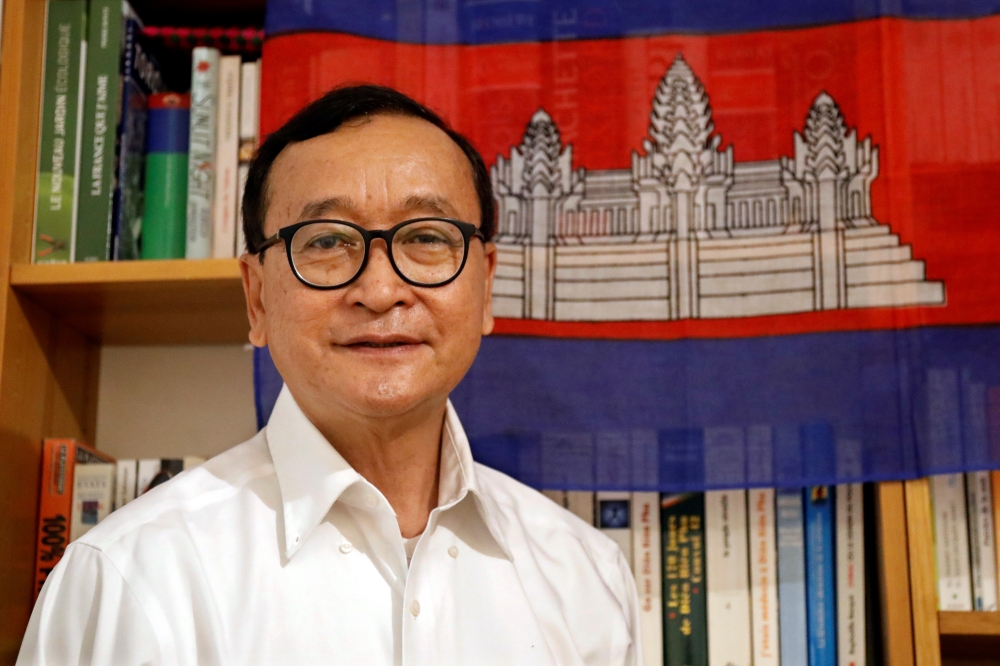 Self-exiled Cambodian opposition party founder Sam Rainsy poses prior to his departure to Bangkok on Thursday from his Paris base, France, November 6, 2019. Reuters/Charles Platiau