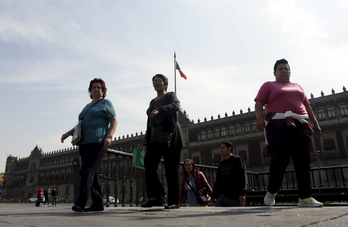 Passengers leave a subway station during a free day of public transport at Zocalo Square in Mexico City, March 17, 2016. Reuters / Henry Romero
 