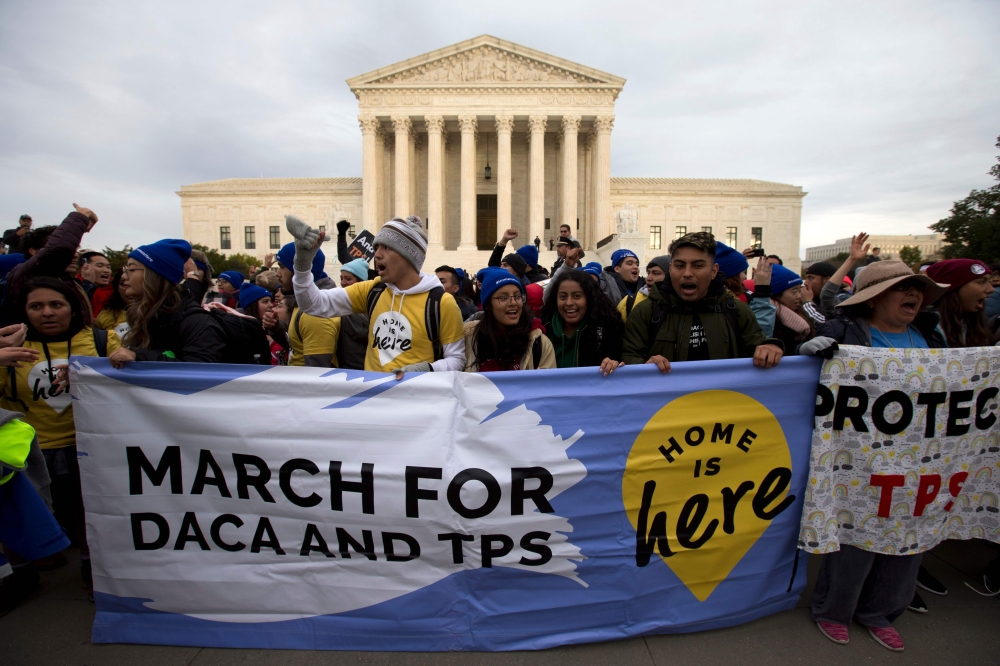 Demonstrators arrive in front of the US Supreme Court during the 