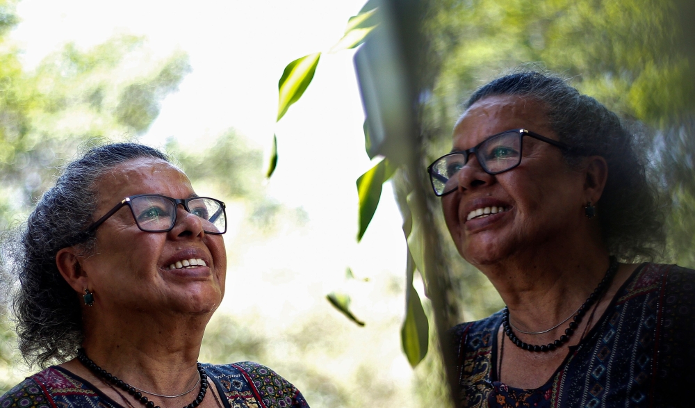 Brazilian Thais de Azevedo, 71, a victim of violence and had her teeth rebuilt by the project 