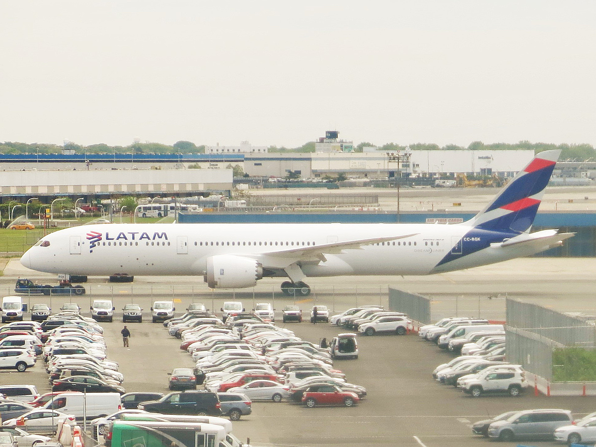 A LATAM Boeing 787-9 Dreamliner having arrived from Chile on its very first revenue flight is being towed from Terminal 8 to Cargo Area B to be parked for the day until its return flight via Peru (Wikimedia Commons) 