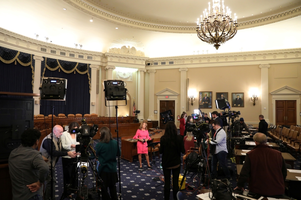Television news crews set up for live reports ahead of Trump impeachment inquiry testimony by Ambassador Bill Taylor, charge d'affaires at the U.S.  REUTERS/Jonathan Ernst