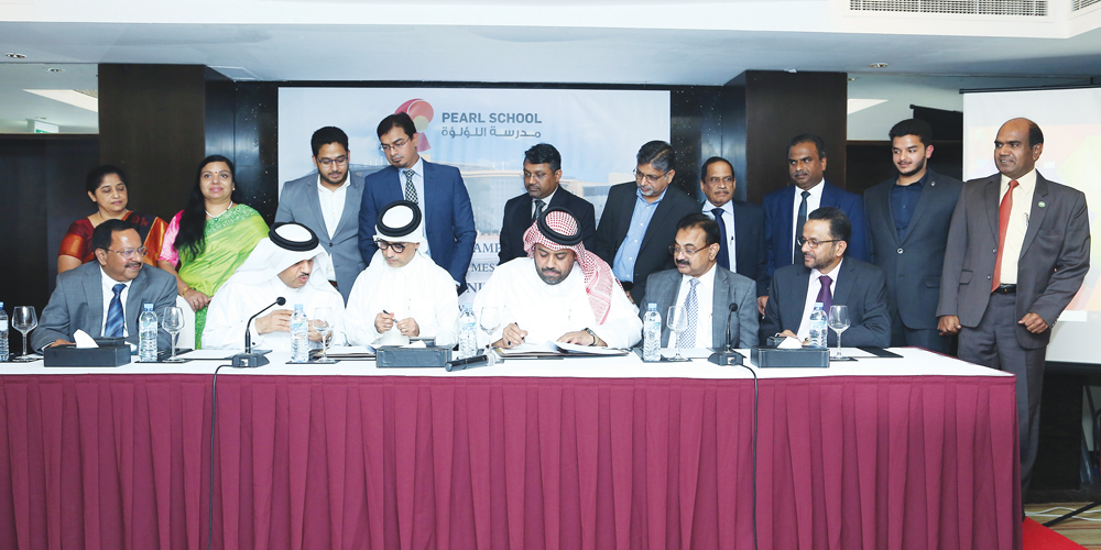 The officials during the contract signing ceremony for building a new campus of Pearl School at Umm Besher near Al Meshaf area close to Al Wakrah.